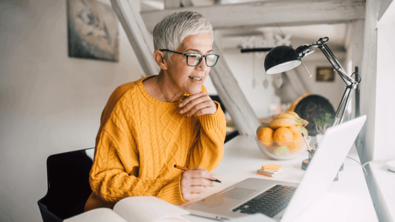 Learner studying course material at home